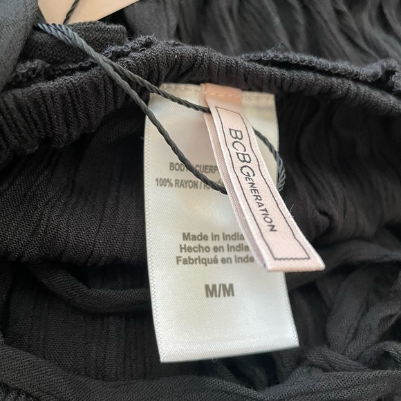 BCBGENERATION
RUFFLED CINCH WAIST SLEEVELESS DRESS SWIM COVER-UP black - Picture 4 of 4